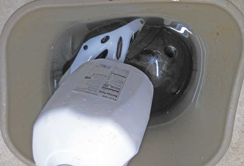 Helmets under bleach/water.