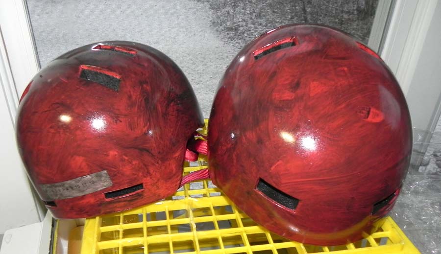 Helmet smeared with chain grease.